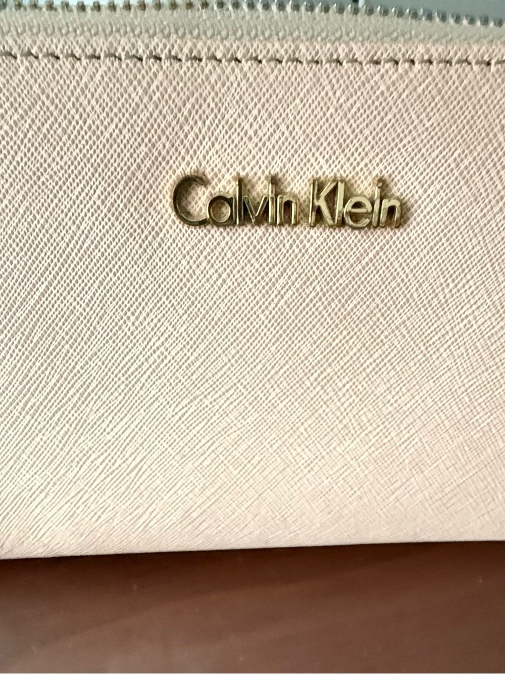 Calvin Klein Pale Pink Saffiano Zip Wallet with Gold Logo